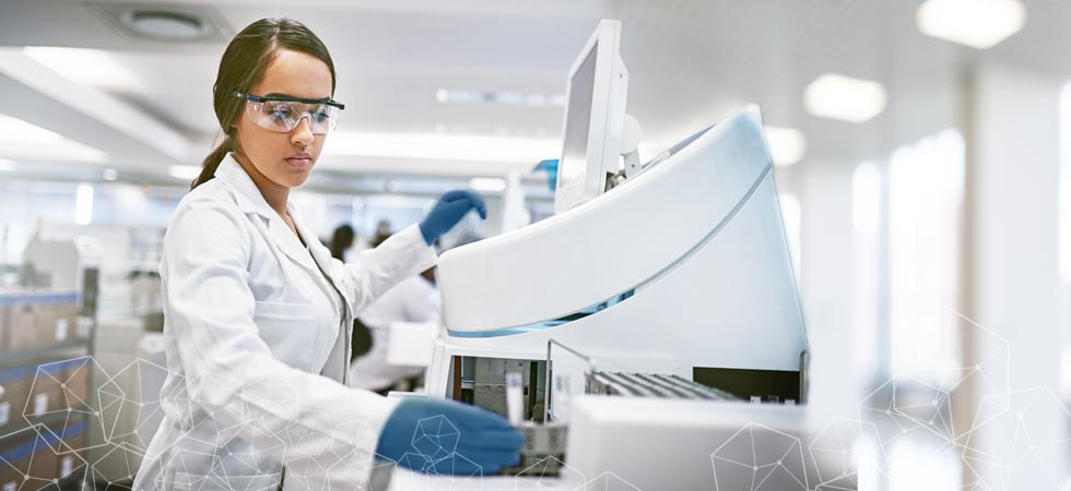 female and male discuss metabolomics results in laboratory