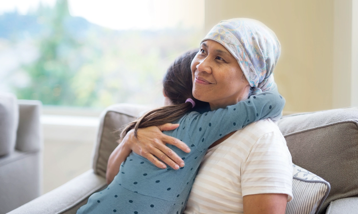 Woman cancer hug - biocrates